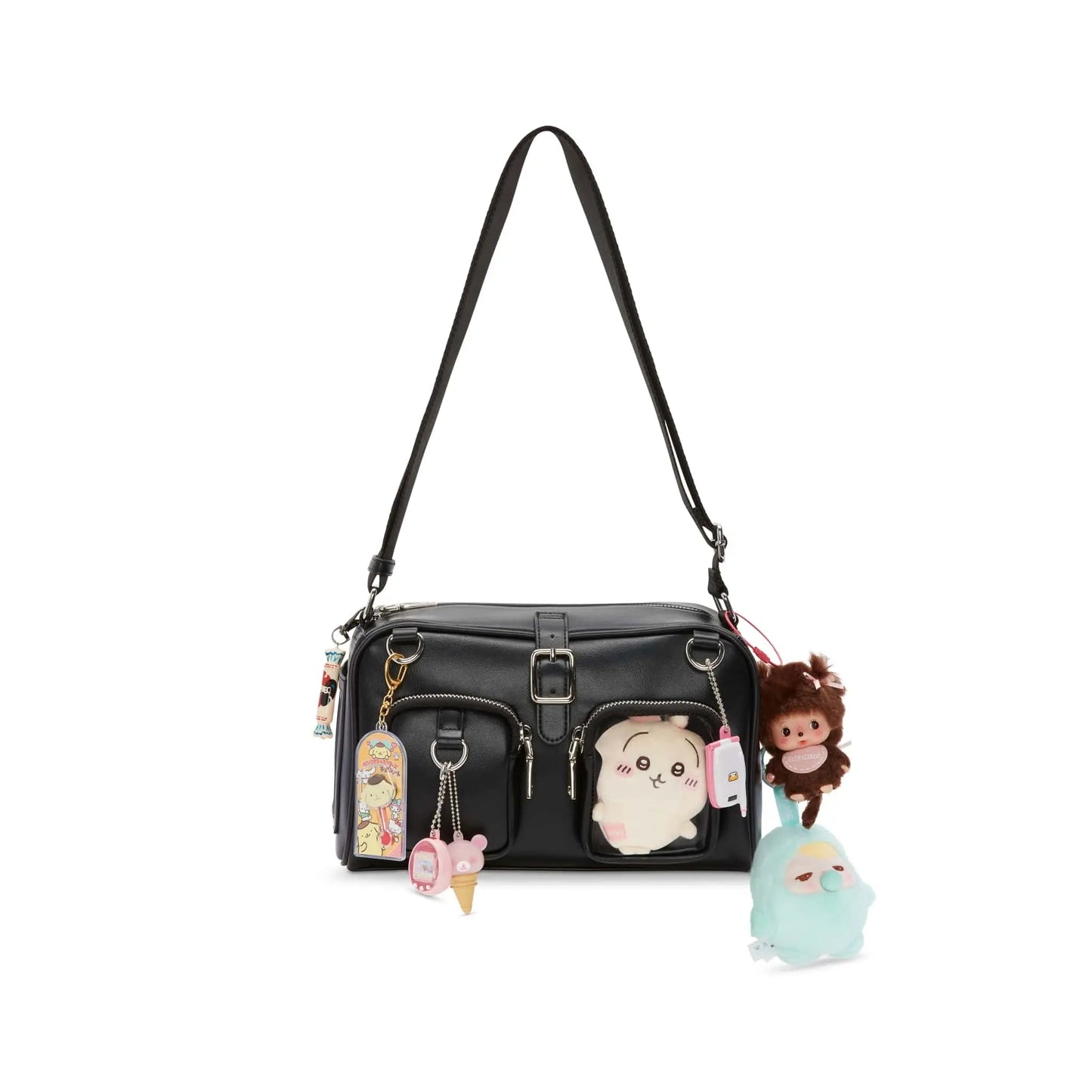 “Trinket handbag styled with plush keychains and K-pop photocards inside display window”